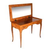19th century, inlaid with fruitwood veneers, lift top revealing mirror, leather slide-out writing su