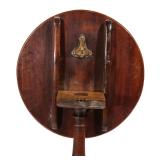  Early 19th century, having a round one piece top h. 24-1/2 w. 19-1/2 d. 19-1/4 in.