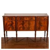 Late 18th/early 19th century, of small size and finely figured woods, the conforming top with reeded