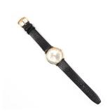 LOT 204 | 14K GOLD PIQUETTE WRIST WATCH | Silvered dial with baton markers, face signed "Piquette" a