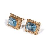Blue aqua set in (tested to) 14k yellow gold with diamond surround, comprising 18 round diamonds; 3.