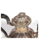 Of small size, having an ebonized wood handle, branch-form spout, and flower finial, with Minerva ha
