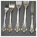 Flatware service set for twelve in "Grand Baroque" pattern, comprising: 12 dinner forks, 12 dinner k