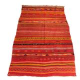 LOT 306 | MOROCCAN RUG | Mid twentieth century, with predominant red & orange colors h. 8 ft. 4 in. 