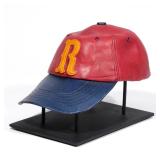 LOT 385 | RICHARD NEWMAN (AMERICAN, B. 1946) | Baseball Cap Ceramic With "R" monogram, signed on the