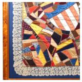 Late 19th / early 20th century, designed as an assortment of geometric swaths of colorful fabrics ha