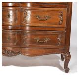 20th century, having three drawers with serpentine front on sculpted cabriole legs h. 34-1/2 w. 47 d