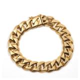 LOT 498 | 18K GOLD CURB LINK BRACELET | Yellow gold, stamped "18K"; 8-1/8 in., 92.3g