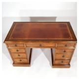 19th century, inset tooled red leather surface, three part construction, with two banks of drawers a