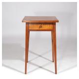 LOT 649 | AMERICAN TIGER MAPLE & CHERRY ONE-DRAWER STAND | 19th century, over hanging top, on straig