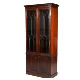 Lot 481  |  GOTHIC REVIVAL MAHOGANY BOOKCASE  |  Early 20th century, lacking shelves h. 71-1/2 w. 32