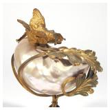 a ormolu and shell vide poche designed as a pearlescent shell resting in a gilt bronze scrollwork an