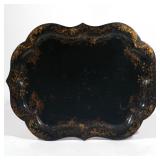 Lot 612  |  ENGLISH PAPIER-MACHE TEA TABLE  |  19th century, scalloped edges with overall gold leaf 