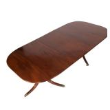 mahogany top with reeded edge, turned standards over tripod bases with splayed reeded legs ending in