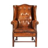 Lot 622  |  ENGLISH LIBRARY LEATHER WING CHAIR  |  With tufted leather backrest and removable seat c