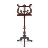 Lot 627  |  ENGLISH MAHOGANY MUSIC STAND  |  19th century, carved wood with scrolling acanthus motif