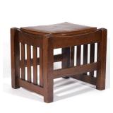 Lot 636  |  LIFE-TIME OAK FOOTSTOOL  |  Having slatted sides and a drop-in-cushion h. 14 w. 16 d. 14