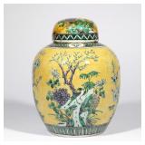 Lot 90  |  19TH CENTURY CHINESE FAMILLE JAUNE JAR  |  Jiaqing reign (1796-1820), showing dual-magpie