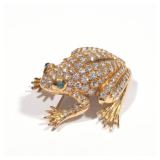 Lot 99  |  DIAMOND, EMERALD, & 18K GOLD FROG BROOCH  |  Designed as a frog encrusted with diamonds a