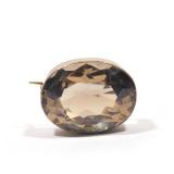 Lot 103  |  28 CARAT ANTIQUE CITRINE BROOCH  |  Faceted citrine measuring approximately 24 x 18.5 x 
