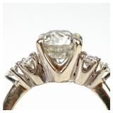 1.75ct Old European Brilliant cut diamond flanked by six .05ct round brilliant diamonds in a 14k whi
