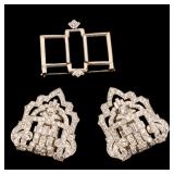 Art Deco motif dress clips, each mounting an approximately 1/4 carat old European brilliant cut diam