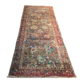 Lot 164  |  NORTHWEST PERSIAN LONG RUG  |  Early-mid 20th century, with arabesques of palmettes on a
