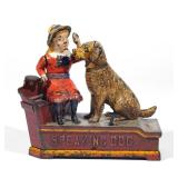 Lot 288  |  SPEAKING DOG MECHANICAL BANK  |  Designed as a girl sitting on a bench with a dog by her