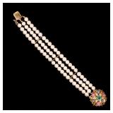 Lot 306  |  "BDE" PEARL, GEMSTONE, & GOLD BRACELET  |  Designed as three strands of pearls connected