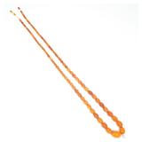 Lot 339  |  GRADUATED AMBER BEAD NECKLACE  |  Largest bead l. 26mm, strand l. approx. 46 in.; 74.2g