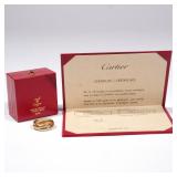 Lot 353  |  LE MUST DE CARTIER TRINITY RING  |  Tricolor 18k gold ring complete with original box an