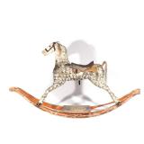 fruitwood horse with bobbed tail and side swept mane, with original dappled paint and curved rockers