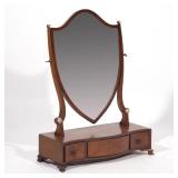 Lot 461  |  HEPPLEWHITE SHIELD-BACK DRESSING MIRROR  |  Early 19th century, shield form mirror over 
