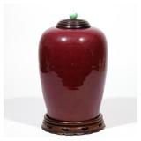 19TH CENTURY OR EARLIER CHINESE OVOID GLAZED JAR | Red / oxblood flambe lidded jar h. 12-1/4 dia. 8 