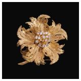 18K EN TREMBLANT GOLD & DIAMOND FLOWER PIN | Beautifully made textured gold with 16 melee diamonds. 