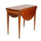 PERIOD AMERICAN PEMBROKE CHERRYWOOD TABLE | Oval-shape with bellflower on knees h. 31-1/2 w. 38-1/2 