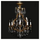 BACCARAT FRENCH BRONZE & CRYSTAL CHANDELIER | having 8 lights and crystal drops suspended from a dor