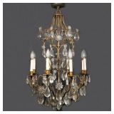 LOUIS XVI-STYLE ROCK CRYSTAL CHANDELIER | Rock crystal mounted gilt bronze birdcage-form chandelier,