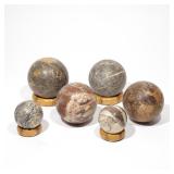 (6PC) HARDSTONE SPHERES | Including three approx. 5-inch diameter stone spheres (two with stands), p