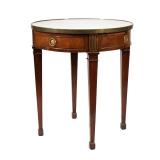 19TH CENTURY LOUIS XVI-STYLE BOUILLETTE TABLE | Having inset marble top, ormolu banding h. 27 dia. 2