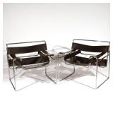 PAIR WASSILY ARMCHAIRS | Chrome-plated steel and black leather, no apparent labels. h. 28-1/2 w. 27 