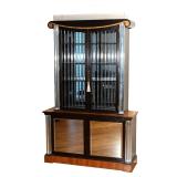 LORIN JACKSON ART DECO STEP-BACK CABINET | Circa 1935, Zebrawood and Philippine mahogany cabinet wit