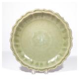 CHINESE LONGQUAN CELADON CHARGER | Ming dynasty (1368-1644), with scalloped, barbed rim, fluted cave