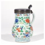 CHINESE WUCAI PORCELAIN JUG | Kangxi period, an export piece in the form of a jug or stein with sing