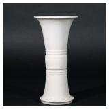 CHINESE DEHUA PORCELAIN GU VASE | Kangxi period (1662-1722), of gu shape with a central section carv