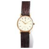 ROLEX PRECISION WRISTWATCH | With original brown leather band; 36g total weight.
