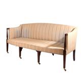 FEDERAL MAHOGANY SOFA | Late 18th century, having bowed crest rail over upholstered backrest and sea