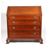 CHIPPENDALE CHERRY SLANT FRONT DESK | Late 18th / early 19th century, with fitted interior, four dra