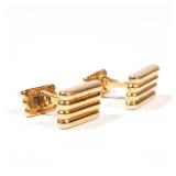 PAIR VAN CLEEF & ARPELS 18K GOLD CUFFLINKS | Ribbed design in yellow gold, each signed "VCA 750 (c) 