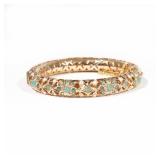 14K GOLD OPENWORK HARD BRACELET | With green faceted stones and cabochons and with seed pearls; inte